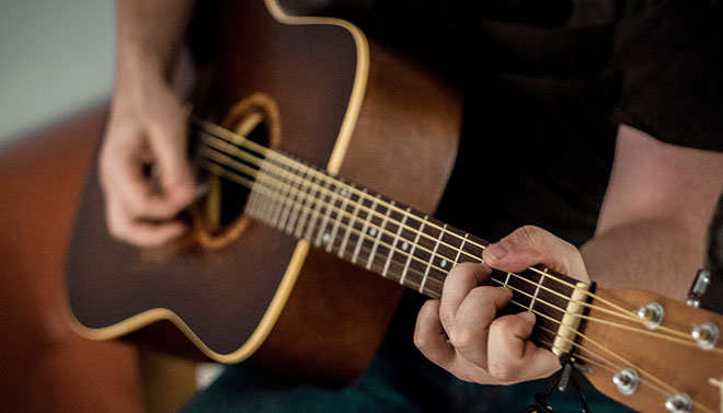 brown guitar, guitar player